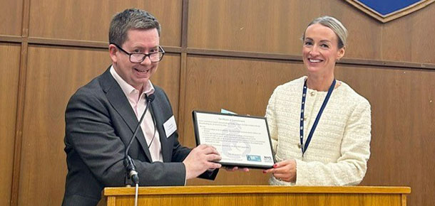 SLC Chief Executive Paul Manning receives the certificate of accreditation from the breastfeeding friendly scheme 